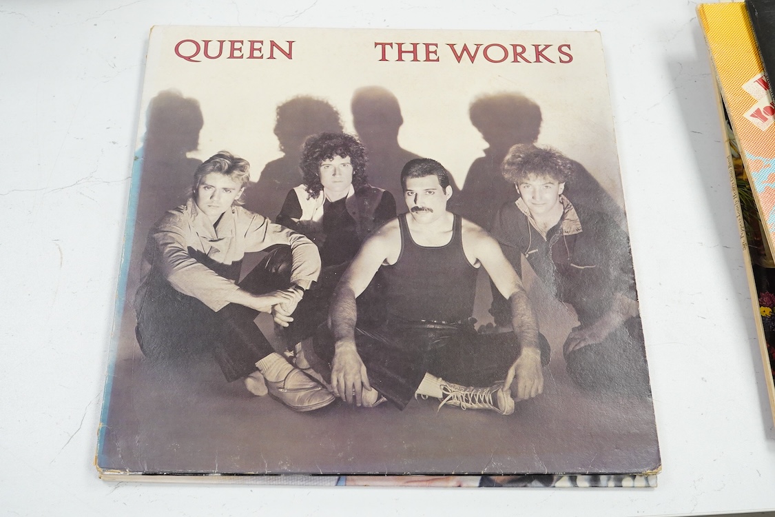 Fourteen LP record albums including eleven The Beatles and related; Sgt. Pepper’s Lonely Hearts Club Band (plus an additional three others), The Beatles at the Hollywood Bowl, Magical Mystery Tour, Revolver, etc., plus t